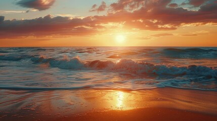A vibrant sunset over a serene beach with gentle waves.