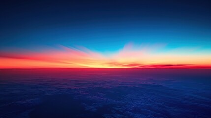 Fototapeta premium Breathtaking horizon captured at dusk, showcasing vibrant colors of blue and orange blending into the sky, creating a serene atmosphere.