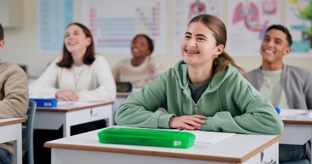 Happy, student and listening to lesson in classroom, high school and smile for education of biology. Group, teenager and girl with knowledge of science, paper and preparing for exam and classmates