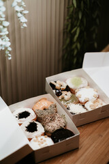 a treat of sweet delicious doughnut in sunny day at the cake shop