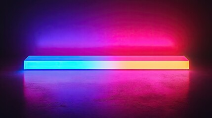 Obraz premium Multicolored neon rectangular object glowing brightly in the dark, creating an abstract effect.