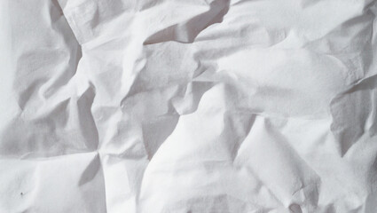 Obraz premium white crumpled and creased glued wrinkled paper poster texture background 