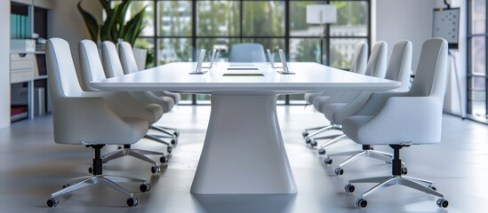 modern dining room with round tables and chairs, large windows overlooking the mountainous landscape
