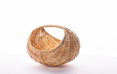 Half moon type flower basket on white background, Wicker basket for Onam festival