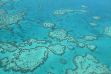 The Great Barrier Reef coral system seen from above in a small airplane