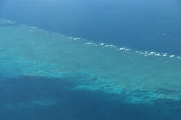 The Great Barrier Reef coral system seen from above in a small airplane