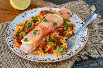 Baked salmon with chorizo rice