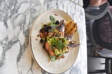 Nicely plated gourmet food in a fancy restaurant in australia