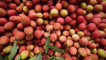 Freshly picked ripe lychees, ready for sale at the market. Vibrant colors and juicy sweetness of this tropical delight, straight from the orchard to your table. Lychee, Litchi, Lichee, fruit