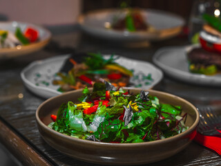 A vibrant and nutritious plate featuring an assortment of fresh vegetables, lean proteins