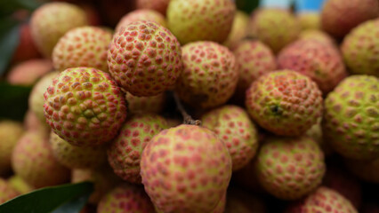 Freshly picked ripe lychees, ready for sale at the market. Vibrant colors and juicy sweetness of this tropical delight, straight from the orchard to your table. Lychee, Litchi, Lichee, fruit