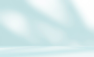 Empty blue room studio with shadow of leaves on concrete wall and floor for product presentation. Sunlight effect shadow. Minimal summer backdrop. Cosmetic, beauty and fashion showroom.