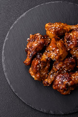 Delicious crispy baked chicken wings in teriyaki sauce