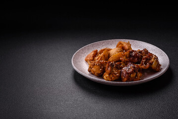 Delicious crispy baked chicken wings in teriyaki sauce
