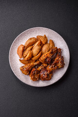 Delicious crispy baked chicken wings in teriyaki sauce