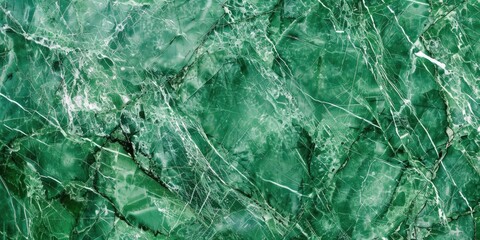Fototapeta premium Close-up of a green marble surface with crystal swirls, suitable for modern bathrooms and kitchens.