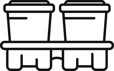 Two paper cups standing in a cardboard holder are waiting to be taken away