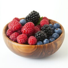 A medium shot of a variety of berries in a wooden bowl, isolated on a white background.