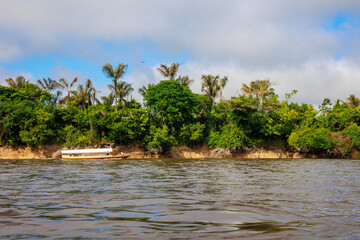 Navigating the Amazon River. In the Amazon jungle, near Iquitos, Peru. South America.