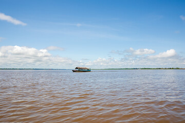 Navigating the Amazon River. In the Amazon jungle, near Iquitos, Peru. South America.