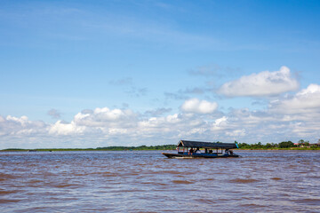 Navigating the Amazon River. In the Amazon jungle, near Iquitos, Peru. South America.