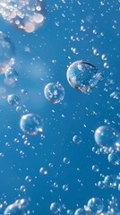 Close up of water bubbles on blue background. Abstract blue fresh hygiene template. Luxury cosmetics body care and clean energy. Concept shot of transparent elegant vitality serum air bubbles