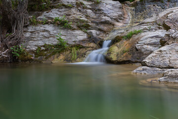 Fresh water lake Maries on the island of Thassos Greece - flowing water from the mountains - waterfalls