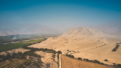Panoramic view the ancient archaeological site of Caral, near Supe, Barranca Province, Peru. Caral is a UNESCO world heritage site and considered to be the oldest city in the Americas.