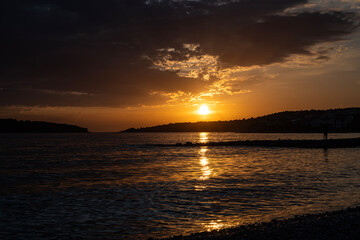 Amazing sunset sky over small town of Rogoznica, Croatia, during summer season