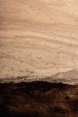 Expensive vintage furniture. The table is covered with epoxy resin and varnished. Luxury quality wood processing. Wooden table on a dark background. Black river made of epoxy resin.