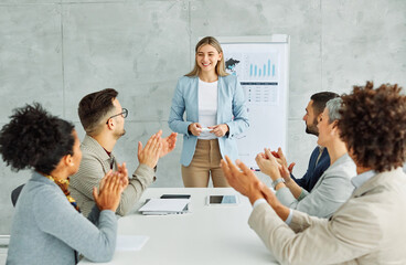 young business people meeting office businesswoman portrait happy smiling applause congratulating...