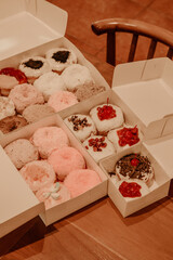 a treat of sweet delicious doughnut in sunny day at the cake shop