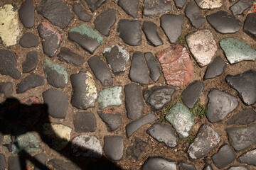 Cobblestone street with a touch of color