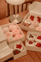 a treat of sweet delicious doughnut in sunny day at the cake shop