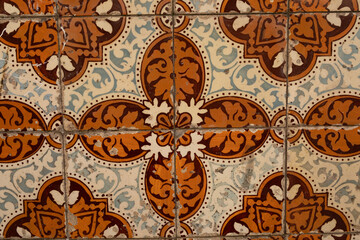Intricate tilework with faded colors and a touch of history