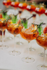 Welcome drink with cocktail glasses and drinks at an event. Alcoholic beverages at a wedding