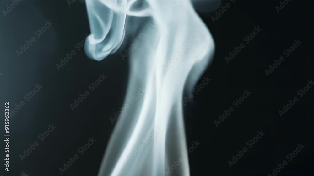 Poster the delicate tendrils of smoke from a recently extinguished candle delicately move in the air formin