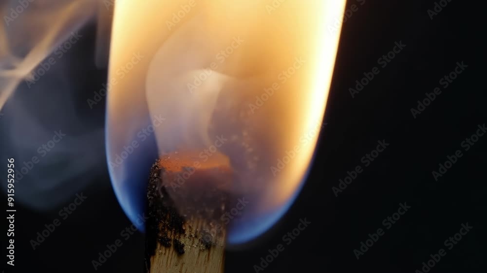 Poster the final moments of a match as it smolders and produces thin wisps of smoke before eventually extin