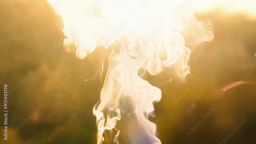Aufkleber A puff of smoke illuminated by the sun creating a magical and otherworldly atmosphere.