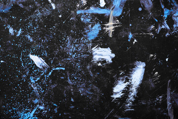 Monochrome abstract texture. Smears of oil paint on an art palette. The concept of the modern school of art. Fragment of creative work. Colors of the year 2024