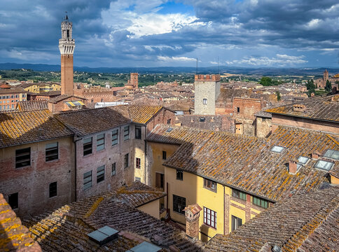Italy, yellow buildings tile roofs. 