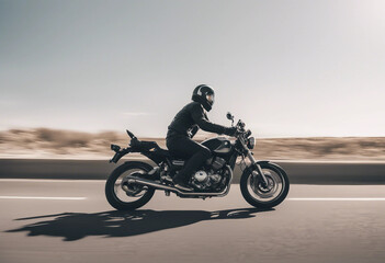 Fototapeta premium Motorbike on the road riding having fun driving the empty road on a motorcycle tour journey Side vie