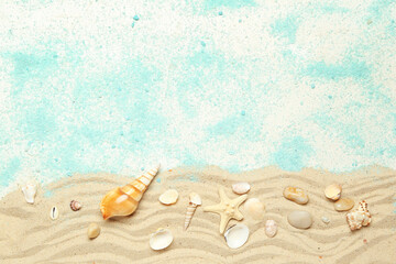 Sand with blue sea salt, seashells and starfishes on white background