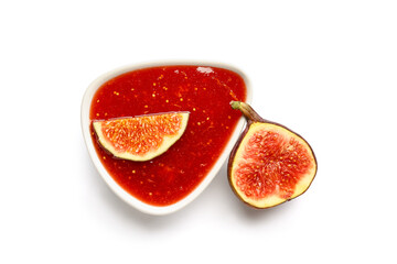 Bowl of sweet fig jam on white background