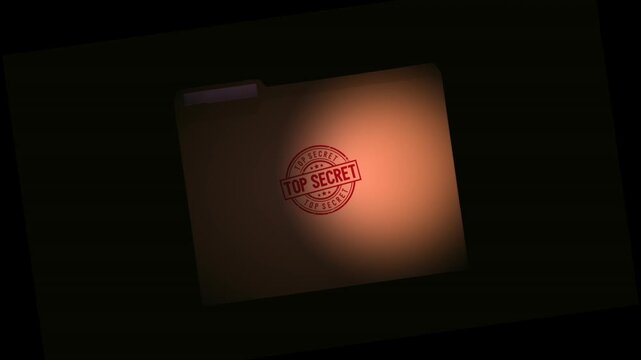 Spotlight moves across top secret folder