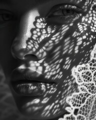 Woman's Face with Lace Shadow in Monochrome