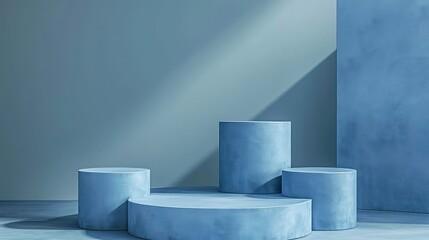 Three light blue cylindrical podiums on a blue floor with blue walls and a shadow.