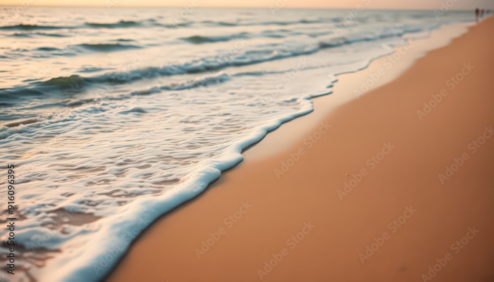 Sticker foamy ocean waves on sandy beach.