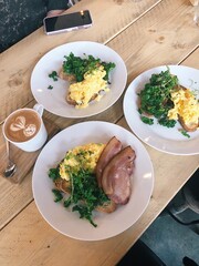 toast and eggs with bacon and latte