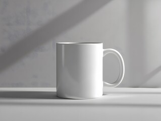 Obraz premium White mug mockup with a subtle logo imprint, placed on a plain background with soft light